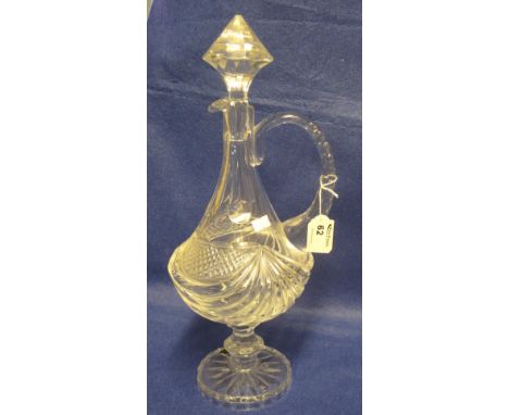 Heavy quality French lead crystal baluster shaped cut glass ewer with pointed conical stopper, loop handle and pedestal circu