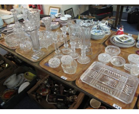 Four trays of assorted glassware to include; pair of celery type pedestal vases, other vases, various paired candlesticks, tr