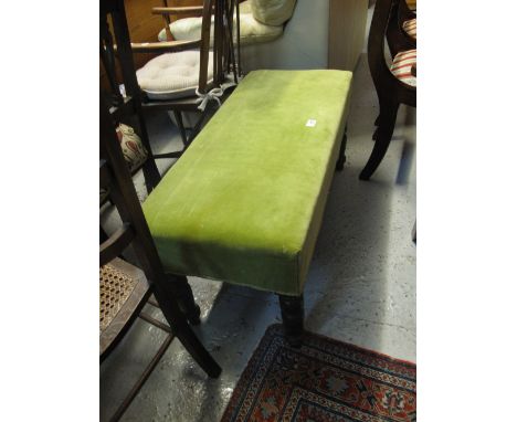 Early 20th Century rectangular upholstered bench or footstool on ring turned legs.