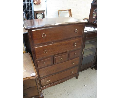 Stag mahogany chest of drawers on bracket feet.