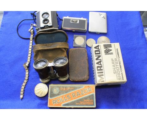 Small box of assorted collectables to include 'Le Jocky Club, Paris', cased binoculars, Miranda compact camera, Brownie refle