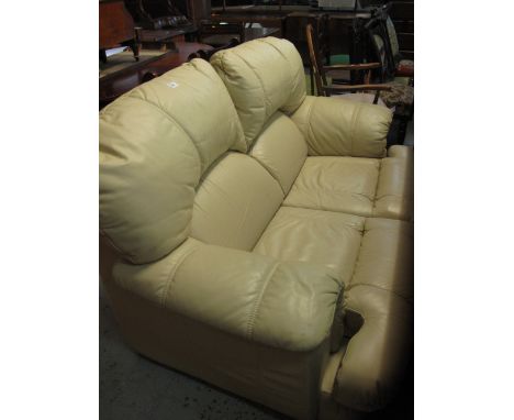 Modern cream leather two seater sofa.