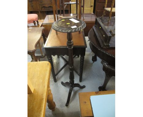 Mahogany carved tripod jardenier stand.