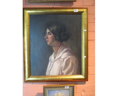 Early 20th Century British School, head and shoulder portrait of a woman, oils on board.  Framed.