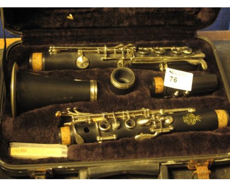 J. Michael Japanese student clarinet in original plastic case.
