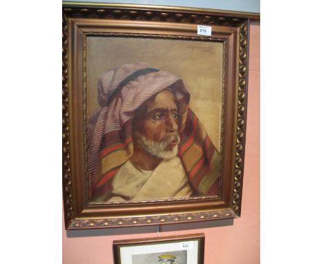 C. Munstermann, 'Portrait of an Arab', signed and dated 1914, oils on canvas.  Framed.