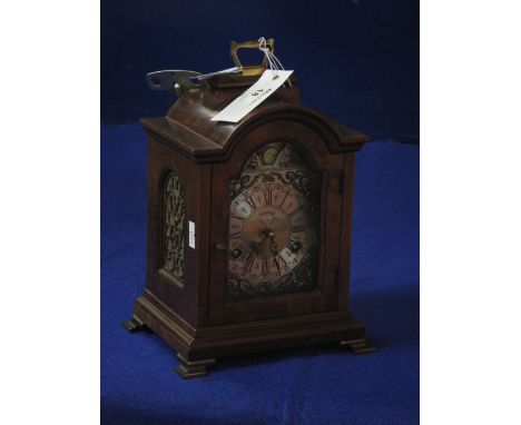 Reproduction walnut cased Georgian style two train bracket clock with rolling moon.
