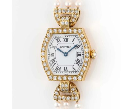A FINE &amp; RARE LADIES 18K SOLID GOLD, DIAMOND &amp; PEARL CARTIER PARIS TORTUE BRACELET WATCH
CIRCA 1980s, REF. 78247
Move
