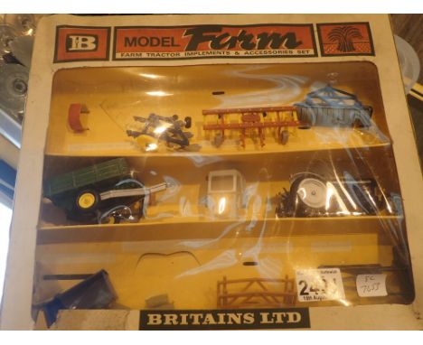 Britains 9596 Farming set including tractor insturments and trailer mostly excellent condition distortion to plastic wheels a