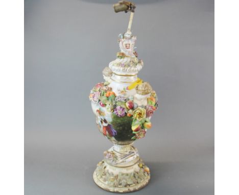 A large 19th Century Meissen porcelain jar and lid later mounted as a table lamp base, in need of restoration. H. 64cm.