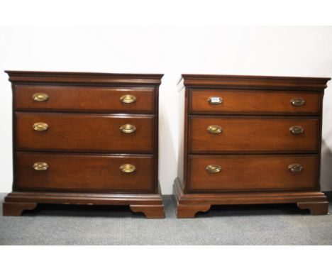 A pair of Stagg three drawer chests, W. 81cm.