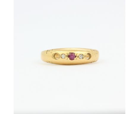 An 18ct yellow gold ruby and diamond ring, (N.5). Two stones missing. Gross weight approx. 2.4gr.&nbsp;