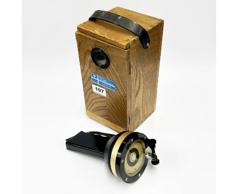 A cased Saura marine instruments hand held compass.