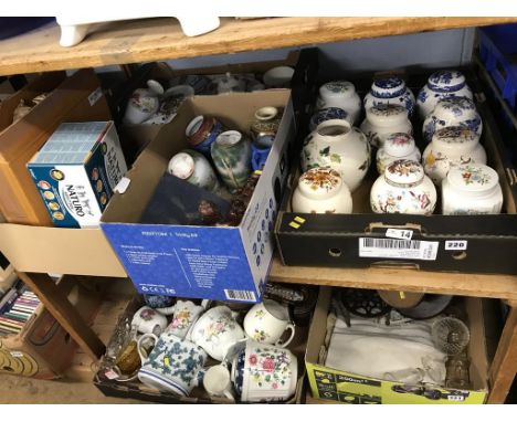 A shelf of assorted china