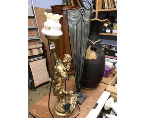 A gilt lamp and two large vases