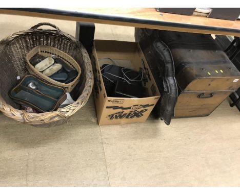 A basket and contents, to include tin trunk etc.