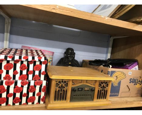 A shelf of assorted, to include a gramophone