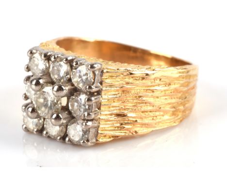 Vintage textured diamond ring, set with round cut diamonds,  estimated total weight 1.00 carat, hallmarked 1975, in 18 ct, ri