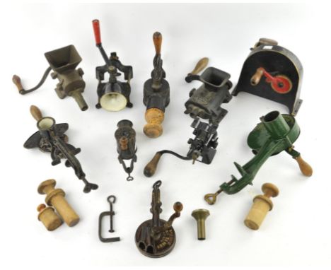 Ten early 20th century cast iron and metal mincers and slicers including ; 'Magic Marmalade cutter', 'Spong's Bean slicer', '