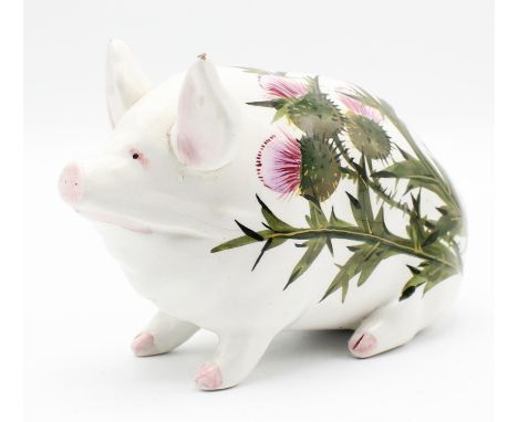 A Wemyss pottery pig decorated in the 'Thistle' pattern, signed. 15.5cm long.Condition Report:  One ear re-glued back on.