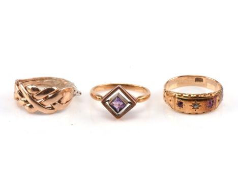 Victorian ruby and diamond ring, with two ruby's and a diamond in a gypsy setting stamped 18 ct, ring size N, an amethyst squ