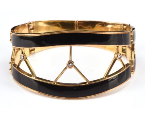 Early 19th C French bracelet, with black enamel hinged panels, ornately detailed clasp, centrally set with five later round b