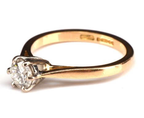 Diamond single stone ring, set with a round transitional cut diamond estimated total diamond weight 0.53 carats, in 18 ct yel
