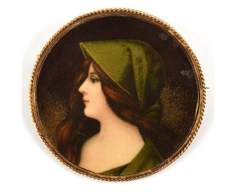 Enamel brooch depicting a lady, 48mm in diameter, with rope work design, mount stamped 9 ctCondition Report:  gross weight 10