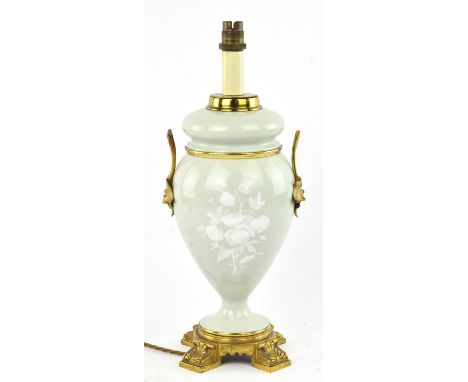 A Victorian style green ceramic table lamp, decorated with a floral bouquet and with gilt metal mounts, height overall 40cm