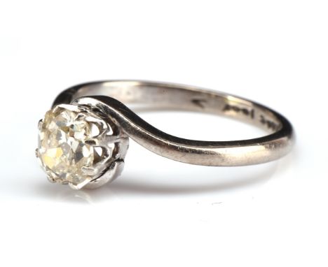 Diamond single stone ring, set with a round old cut diamond approx. 0.47 carats, within a twist white gold shank, tested as 1