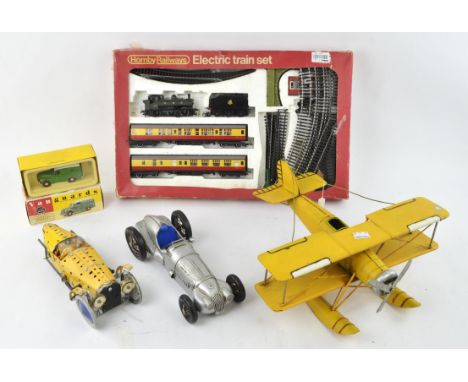 A collection of various toys and models, to comprise a model of a T Ford, a model of a delivery bicycle, a Triang transport t