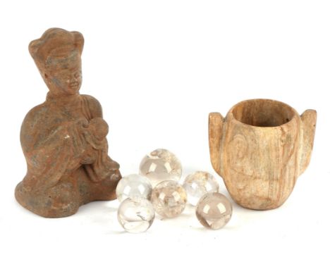 An unglazed, archaistic ceramic figure of a mother and child, about 23 cm high; together with: two hexagonal tiles, each one 