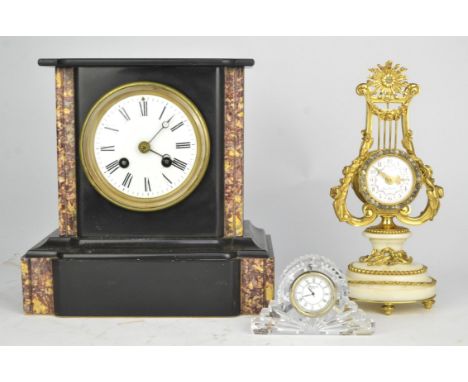A Waterford crystal mantel clock, 6cm high, a Victorian black slate cased mantel clock, 22.5cm high and a 20th century, Marie