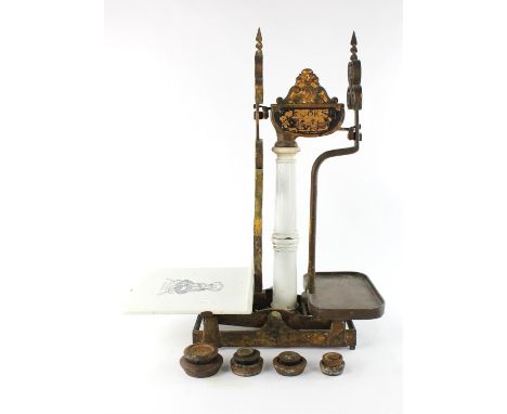 A large set of painted, wrought iron and ceramic scales, by C.A.Crooks, 74 Balls Bond Rd, Kingsland. N., late 19th century, h