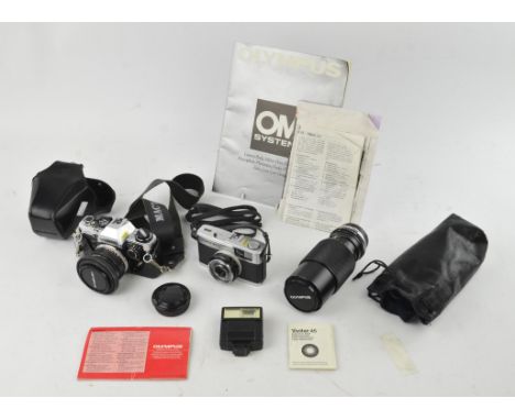 Olympus OM-10 35mm SLR Camera serial no. 2576167, with Zuiko Auto-S 50mm 1:1,8 lens and Auto Zoom 65-200mm 1:4 lens, together