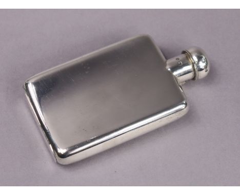 A late Victorian silver pocket spirit flask of curved rectangular shape with hinged ball cap, cm high; London 1899, by W. S. 