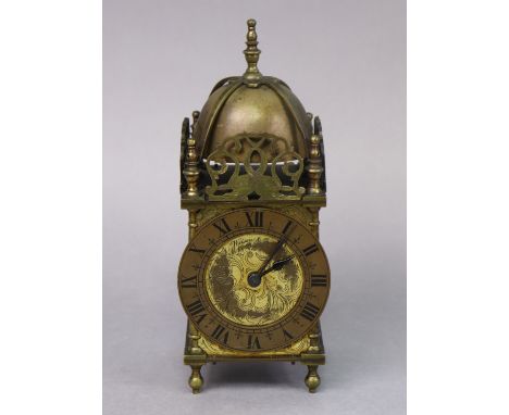 A 17th century style brass lantern clock, the scroll-engraved gilt dial inscribed “Wilson &amp; Gill, 139, Regent St”, French