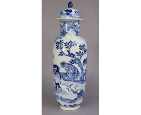 An 18th century Chinese blue &amp; white porcelain tall ovoid vase &amp; cover, decorated with numerous animals including a t