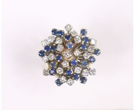 An 18k ring set cluster of numerous small blue &amp; white sapphires; size: M/N; 8.6gm. 