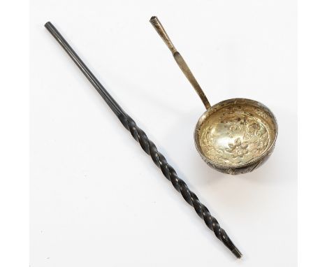 An unmarked silver and whalebone toddy ladle, handle broken, 32gm of weighable silver