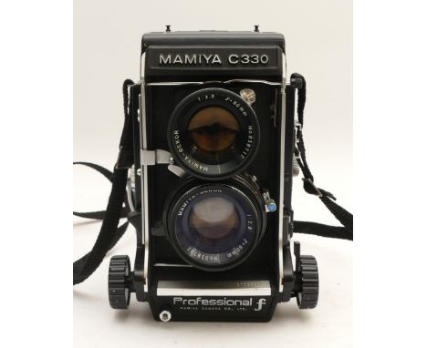 A Mamiya C330 Professional F medium format camera with twins lenses, to include, a Mamiya-Sekor f/2.8 80mm lens.