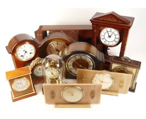 A collection of mid twentieth-century and later mantel, carriage and anniversary clocks, makers to include, W Widdop, Dominio