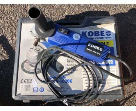A boxed Kobe GA7-115 110v 710w angle grinder, a Rupes LH16E 240v 900w angle grinder with sanding attachment, a large 240v ang