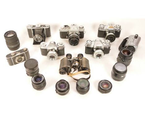 A collection of cameras and camera accessories, to include, a Nikkormat film camera, serial no. 5190324, a Hasselblad film ba