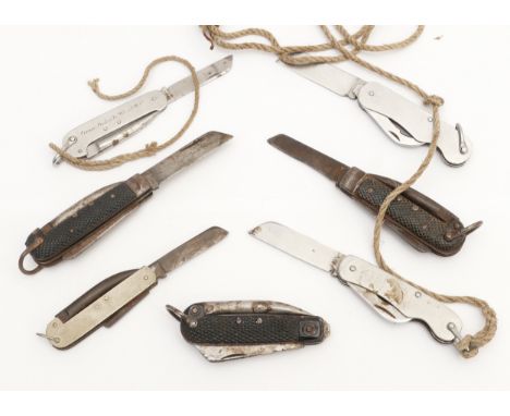A group of seven mid 20th century pocket knives, to include a stainless steel military issue example, stamped BBS 1953 with b