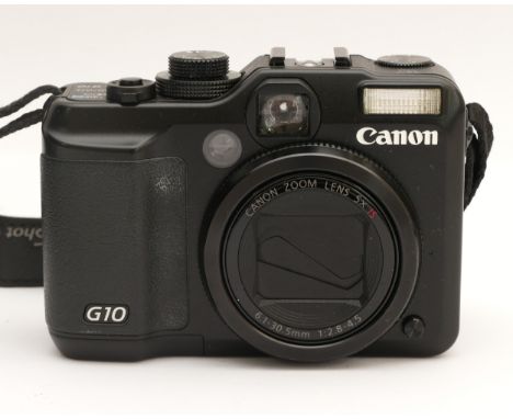 A Canon PowerShot G10 digital camera, in original box.