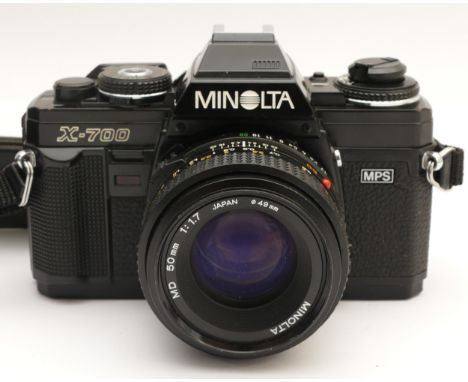 A Minolta X-700 film camera with a Minolta f/1.7 50mm lens.