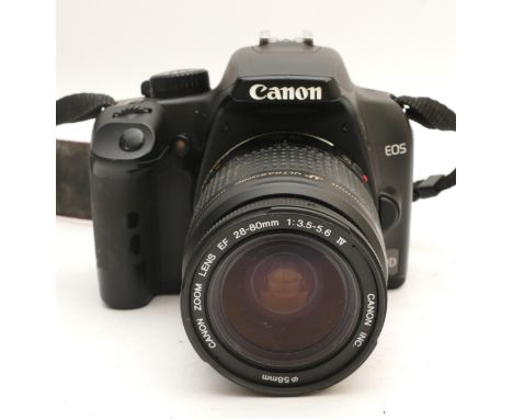 A Canon EOS 1000D digital camera, with a Canon EF f/3.5-5.6 28-80mm lens.