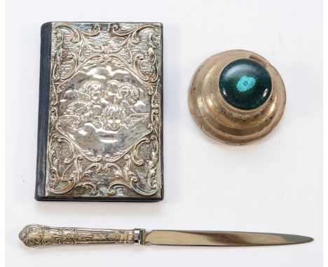 An unused silver address book, London 1991, a silver letter opener and a silver inkwell