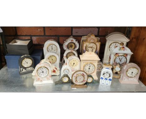 A selection of ceramic clocks, to include, Wedgwood Jasperware, Aynsley, and Portmeiron. (24)